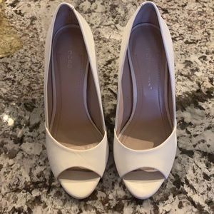 BCBG Generation white heels.